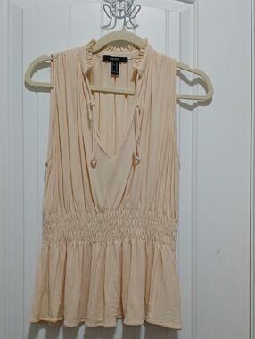Forever 21 Cream Sleeveless Ruffle V-Neck Peplum Top